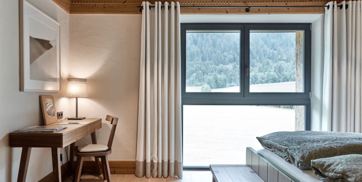 Master bedroom with view into the greenery